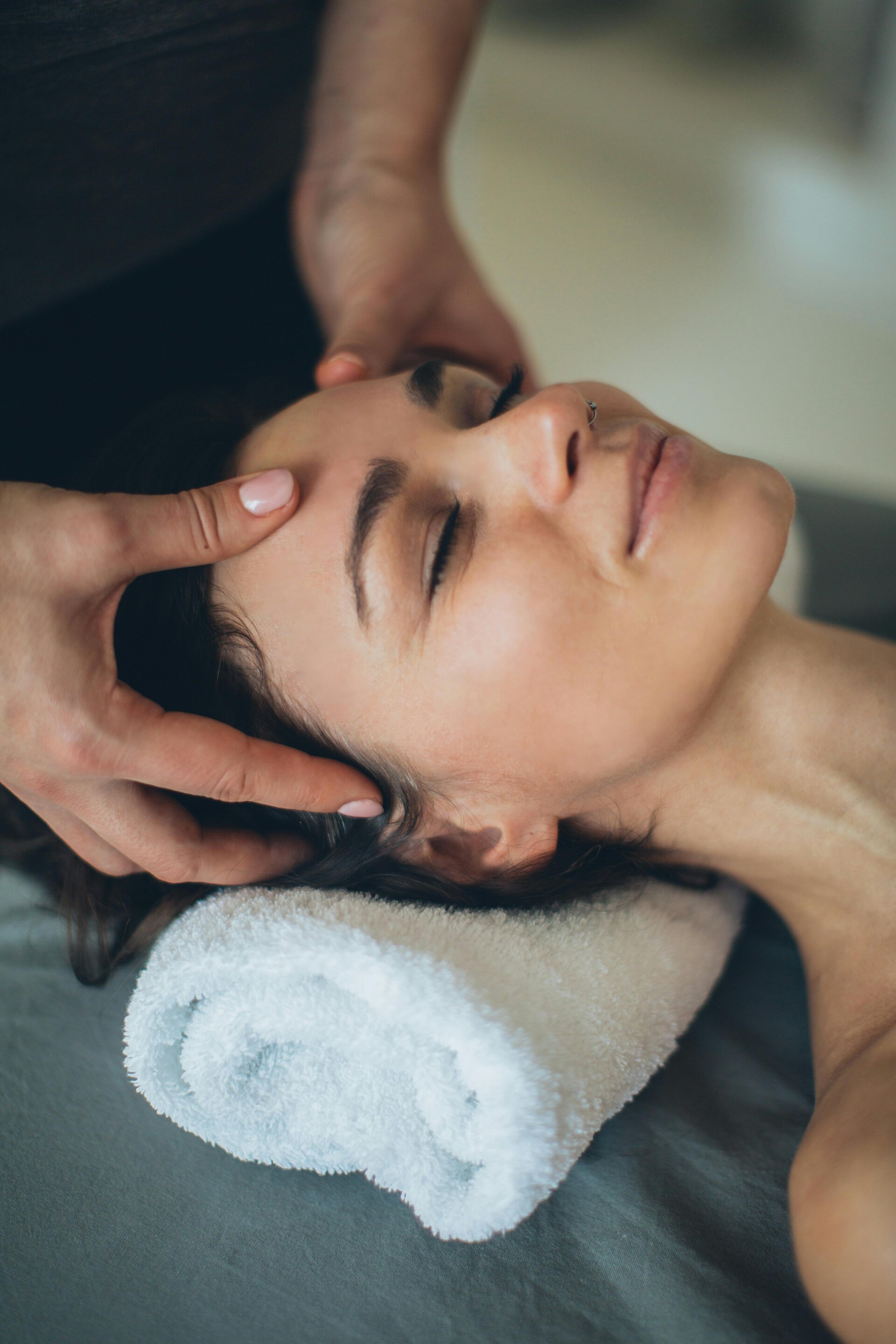 Relaxing facial massage therapy promoting wellness and rejuvenation